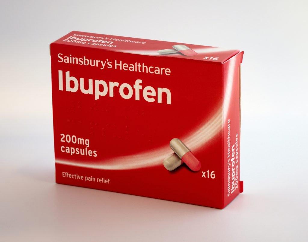 A red and white box of Sainsburys Healthcare Ibuprofen 200mg capsules.
