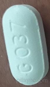 A light blue oval pill with the imprint ZOG 300.