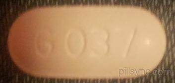 White oval pill with imprint 6037 on one side and a line down the center on the other.
