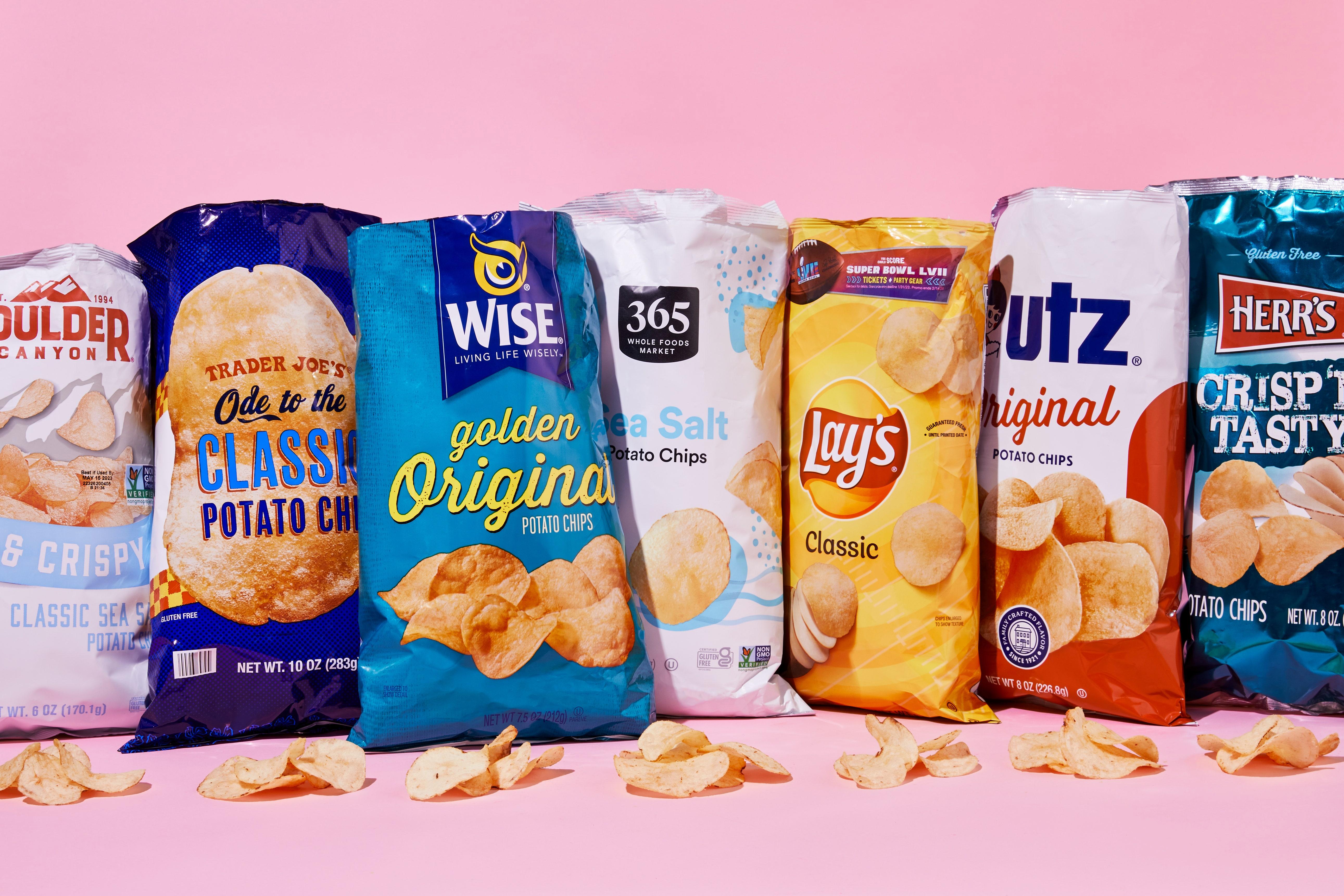 Potato chips in various flavors and brands are displayed against a pink background.