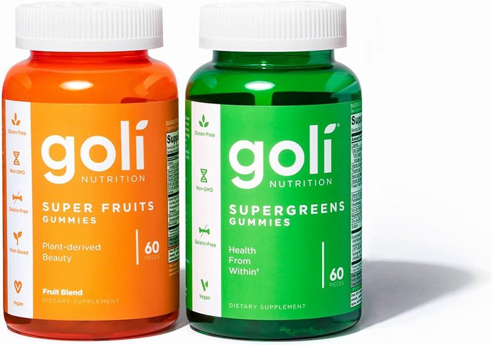 Two bottles of Goli Nutrition gummies, one orange and one green.