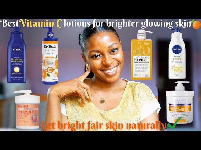 A young woman with dark skin stands in front of a white background, with text reading: Best Vitamin C Lotions for brighter glowing skin. Get bright fair skin naturally.