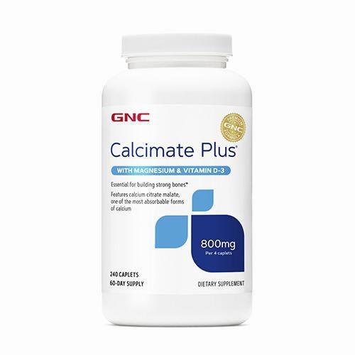 A bottle of GNC CalciMate Plus, a dietary supplement containing calcium, magnesium, and vitamin D3.
