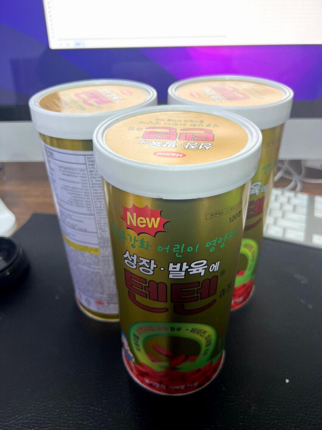 Three containers of a Korean childrens multivitamin supplement.