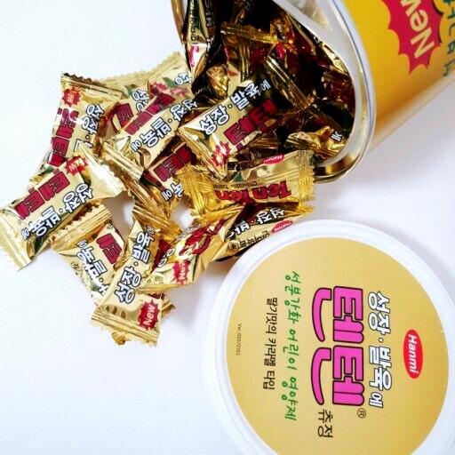 A yellow can of Hanmi New Nutrition for Children, a Korean candy.