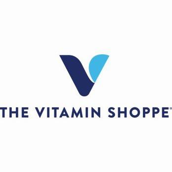 Blue and white logo of The Vitamin Shoppe.