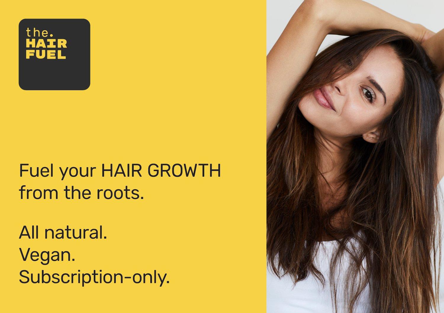 A woman with long brown hair smiles in front of a yellow background with text reading Fuel your hair growth from the roots. All natural. Vegan. Subscription-only.