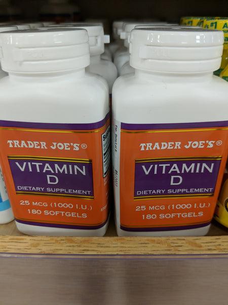 Two bottles of Trader Joes Vitamin D dietary supplement, each containing 180 softgels.