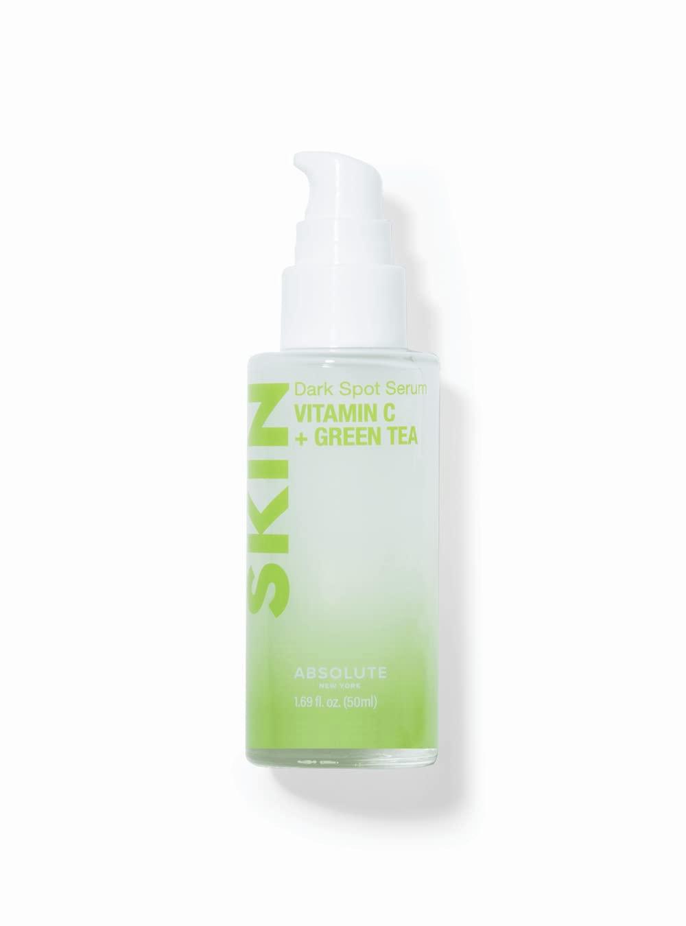 A green bottle of dark spot serum with a white lid.