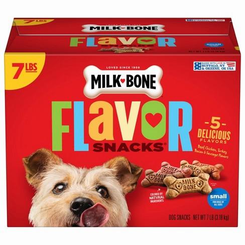 A red box of Milk-Bone Flavor Snacks dog treats in assorted flavors.
