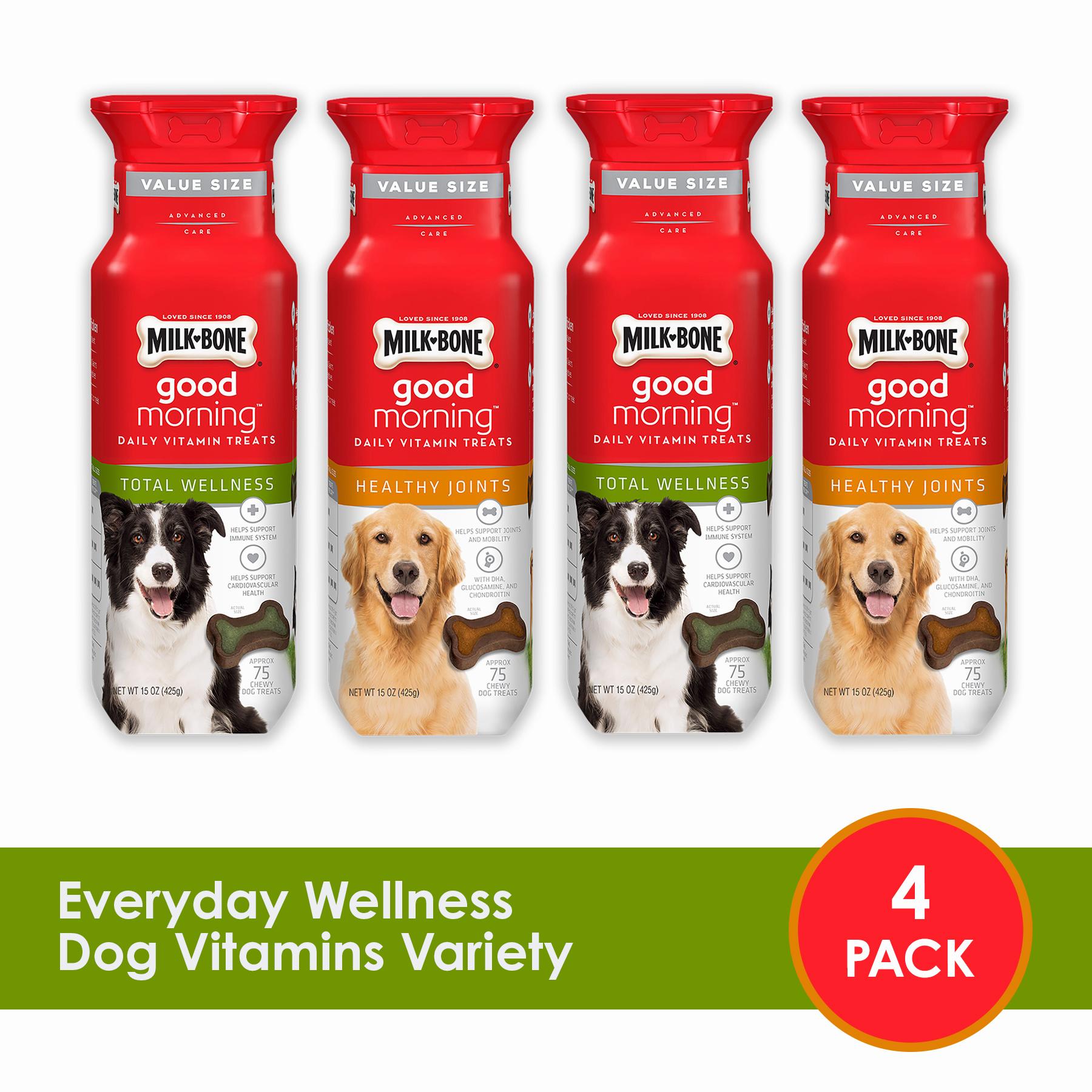 Four containers of Milk-Bone dog vitamins in two flavors.