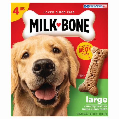 A box of Milk-Bone dog treats, a crunchy textured snack that helps clean dogs teeth.