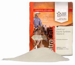 A white powder equine vitamin E supplement in a bag with a cowboy on a horse on the label.