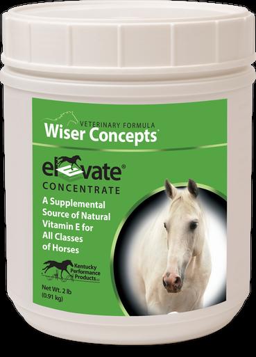 A white plastic tub of equine vitamin E supplement with a green label and a picture of a white horse on it.