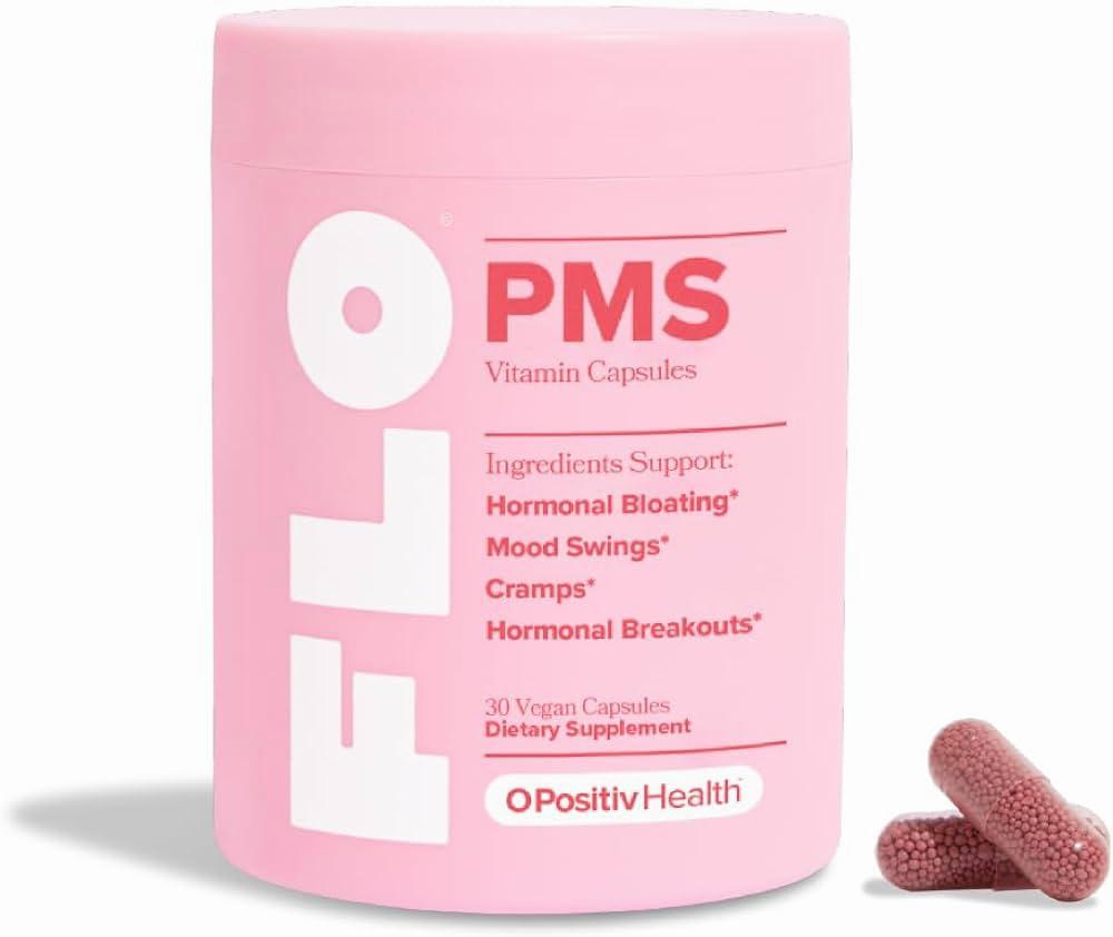 A pink bottle of FLO PMS Vitamin Capsules, a dietary supplement that helps with hormonal bloating, mood swings, cramps, and hormonal breakouts.