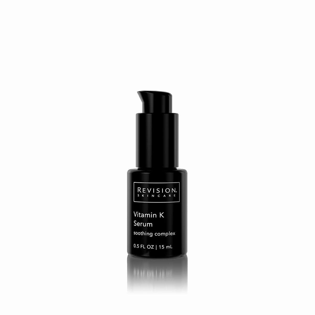 A black Revision Skincare bottle of Vitamin K Serum with a black lid.