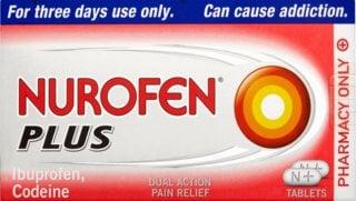A red and white box of Nurofen Plus tablets, a medication used to relieve pain.