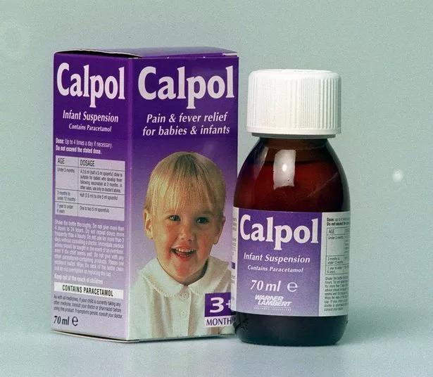 A purple box and bottle of Calpol Infant Suspension, a pain and fever relief medicine for babies and infants.