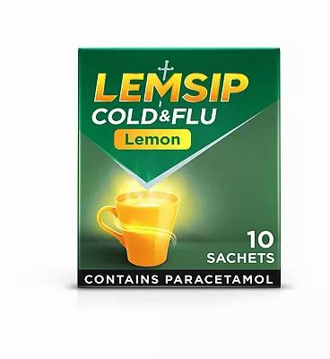 A green and yellow box of Lemsip Cold and Flu sachets in lemon flavor.