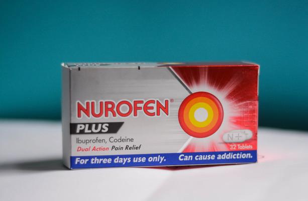 A box of Nurofen Plus, a medication for pain relief.