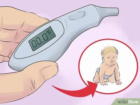 A thermometer in a babys ear.