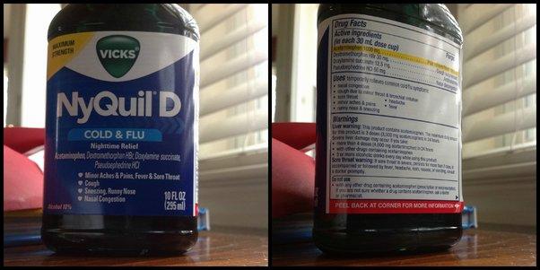 A bottle of Nyquil D, a nighttime cold and flu relief medication.