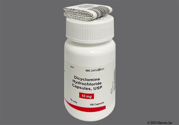 A white bottle of dicyclomine hydrochloride capsules.