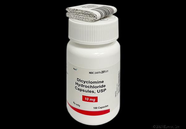 A prescription bottle of dicyclomine hydrochloride capsules.