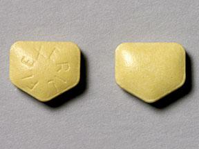 Two yellow pills, each shield-shaped and marked with K 10.