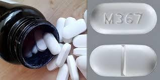 White oval pills with imprint M367.