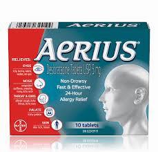 A blue and green box of Aerius allergy relief tablets.