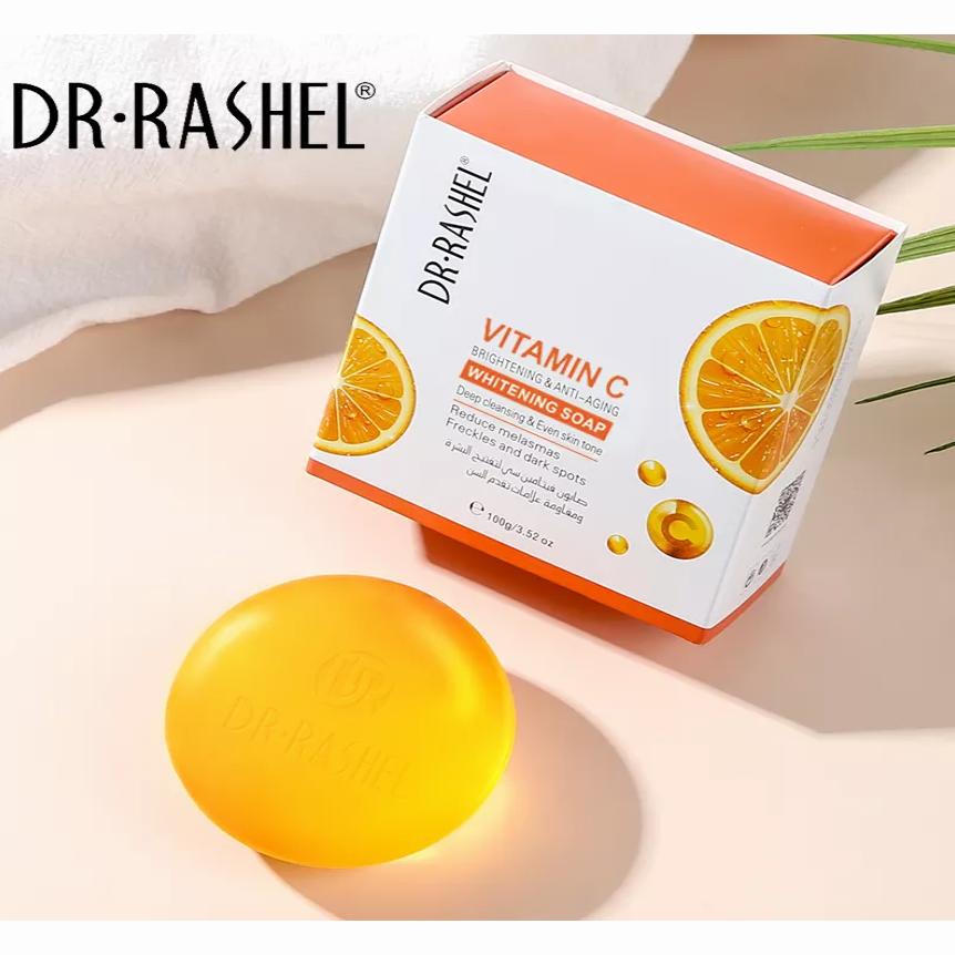 A yellow round soap bar with the text DR.RASHEL on one side and VITAMIN C on the other.