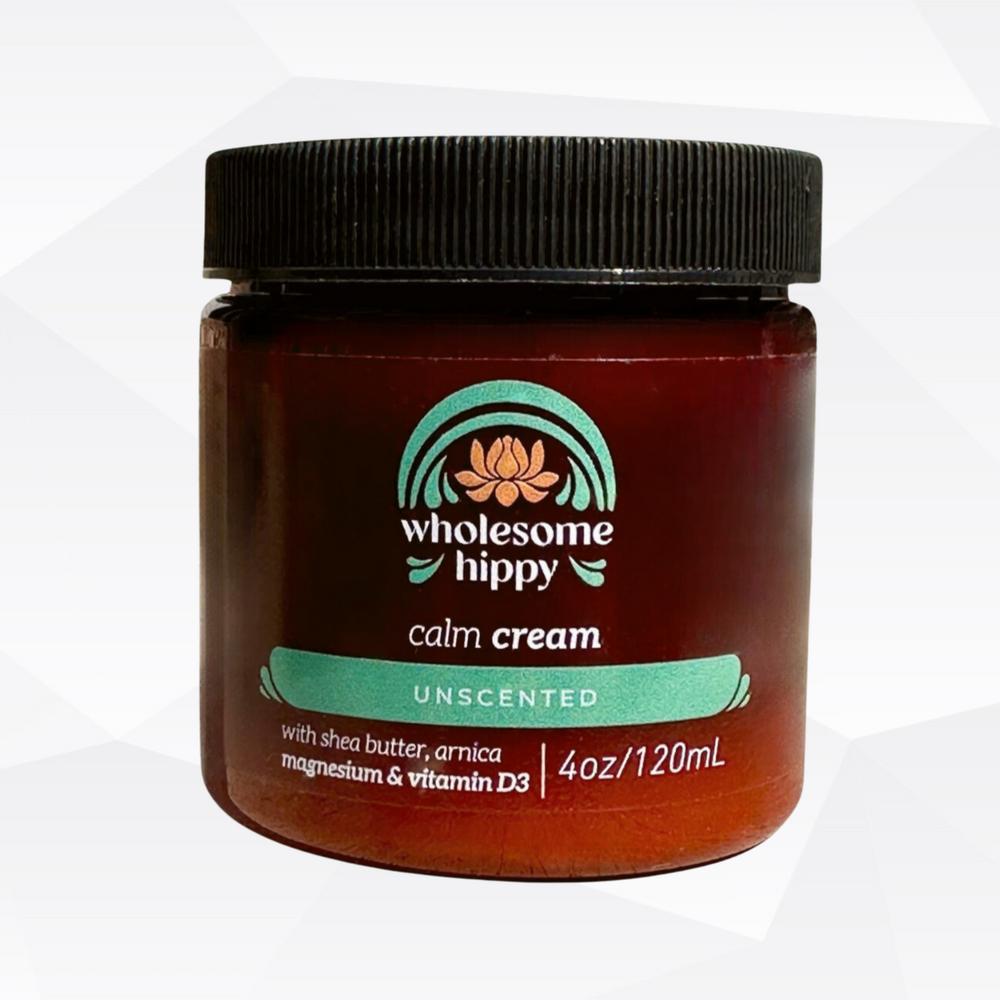 A brown jar of unscented Calm Cream by Wholesome Hippy, containing shea butter, arnica, magnesium, and vitamin D3.