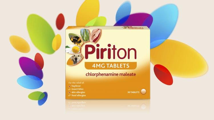 A yellow and red box of Piriton allergy relief tablets.