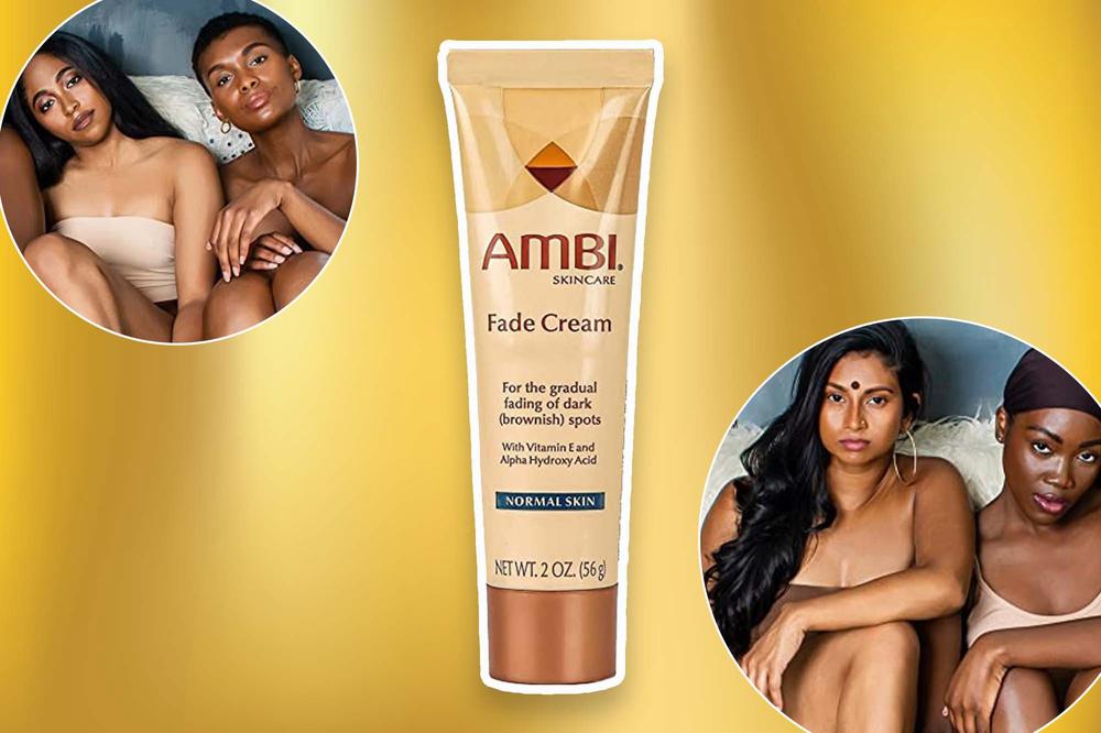 A tube of Ambi Fade Cream with two women of color in the background.