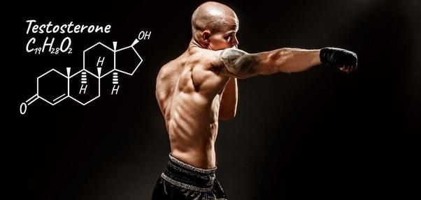 A muscular man in a fighting stance with the chemical formula for testosterone superimposed on the image.
