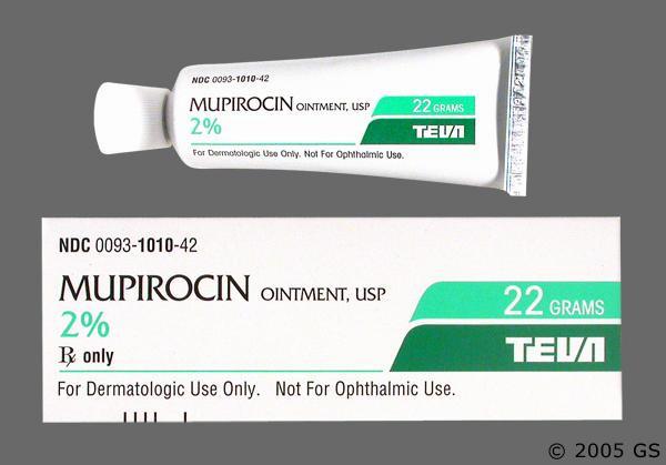 A green and white tube of 2% mupirocin ointment, along with its packaging.