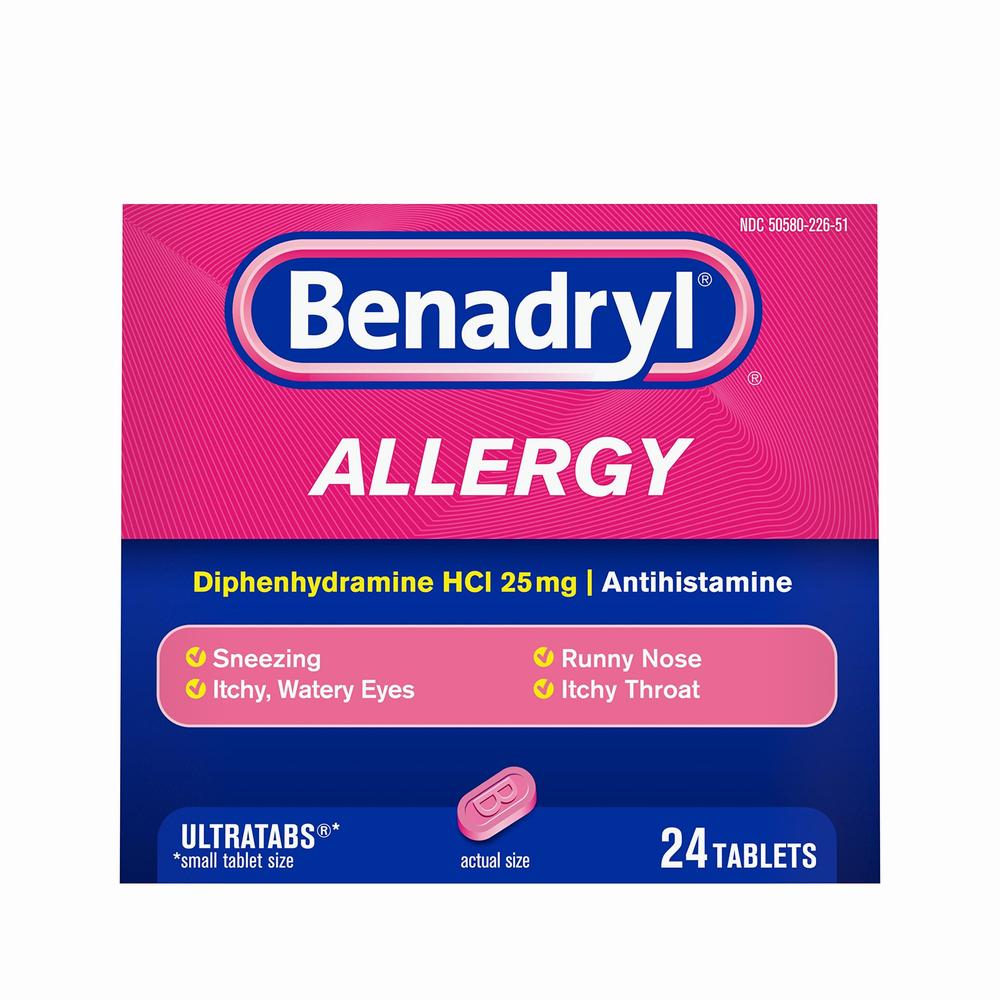 A pink and white box of Benadryl Allergy tablets.