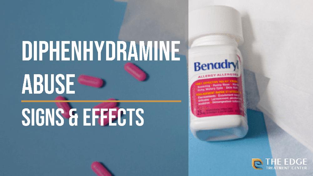 A bottle of Benadryl pills next to several pink pills scattered on a blue surface with text reading: Diphenhydramine Abuse, Signs & Effects.