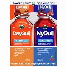 A box containing two bottles of medicine, one labeled DayQuil and the other labeled NyQuil.