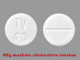 A white round pill with the imprint TV on one side and 52 on the other.