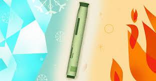 A green stick of TNT between an icy background on the left and a fiery background on the right.
