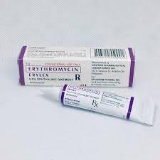 A purple and white box containing a tube of erythromycin ophthalmic ointment.