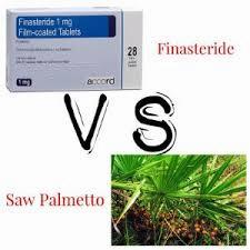 A blue and white box of Finasteride pills next to a green frond of Saw Palmetto berries.
