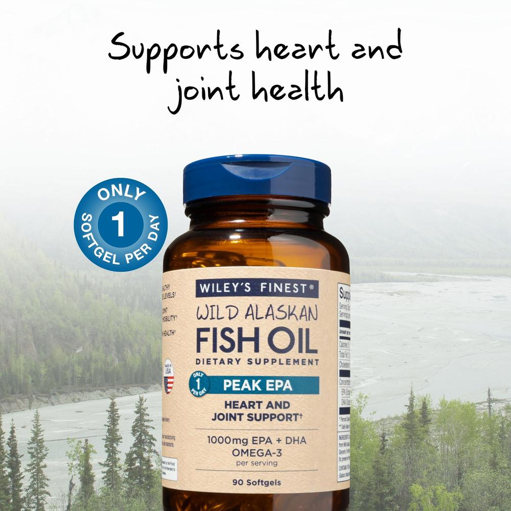 A blue bottle of Wileys Finest Wild Alaskan Fish Oil dietary supplement, which contains 1000mg of EPA and DHA Omega-3 per serving and supports heart and joint health.