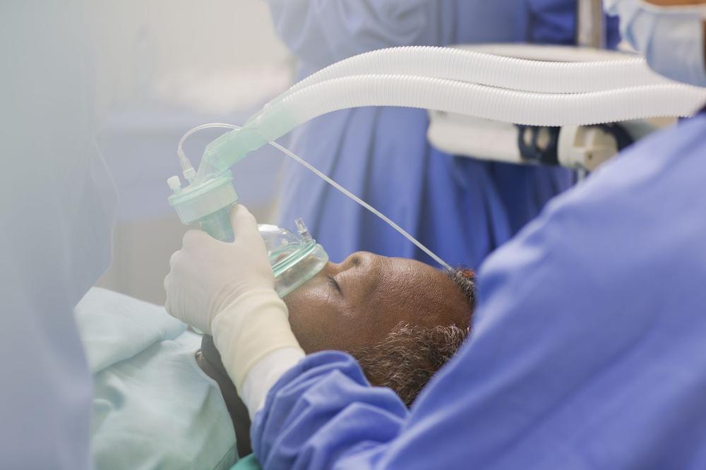 A patient is being put under anesthesia before surgery.