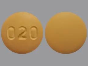 A round yellow pill with the imprint 020 on one side.