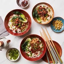 Three bowls of liangpi, a cold noodle dish from Shaanxi Province, China.